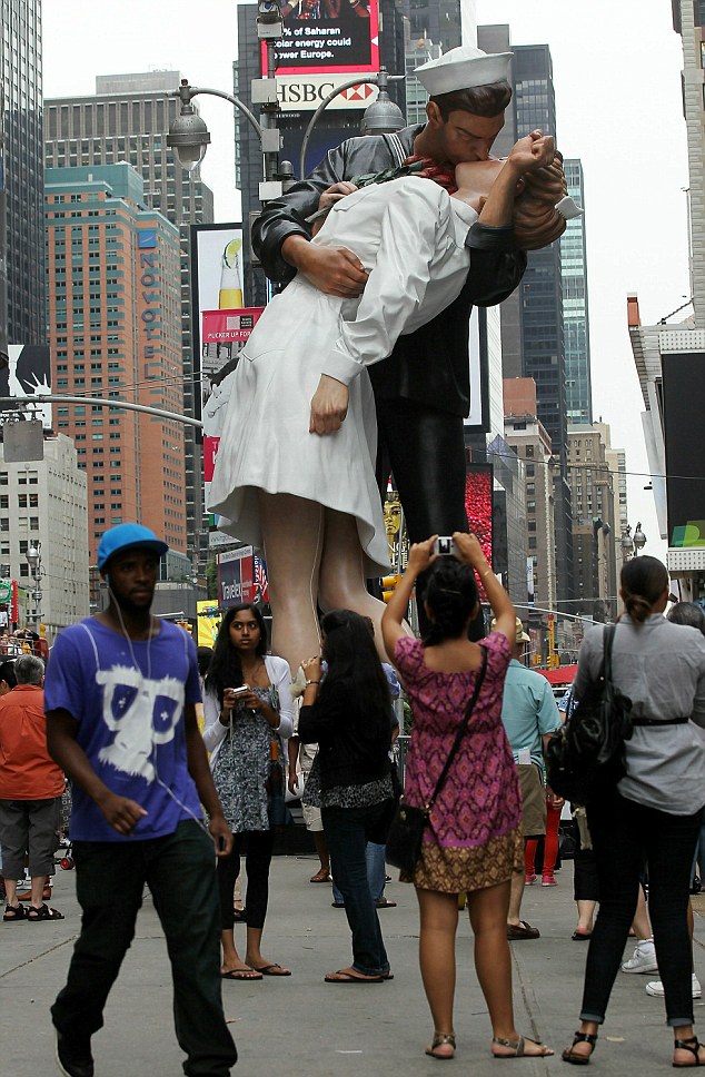 Statue Of Iconic Image Of Soldier And Nurse Kissing Debuts In Times Square